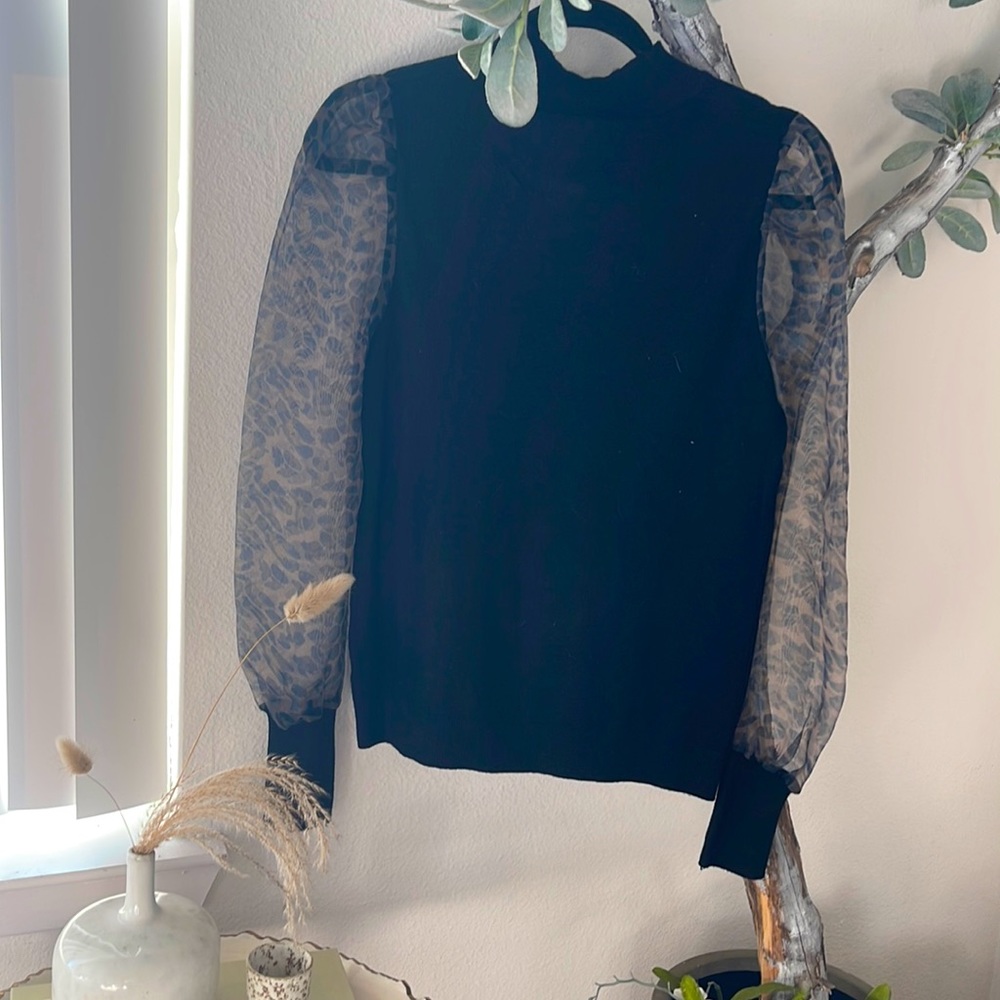 Black top blouse with leopard print see-through sleeves
